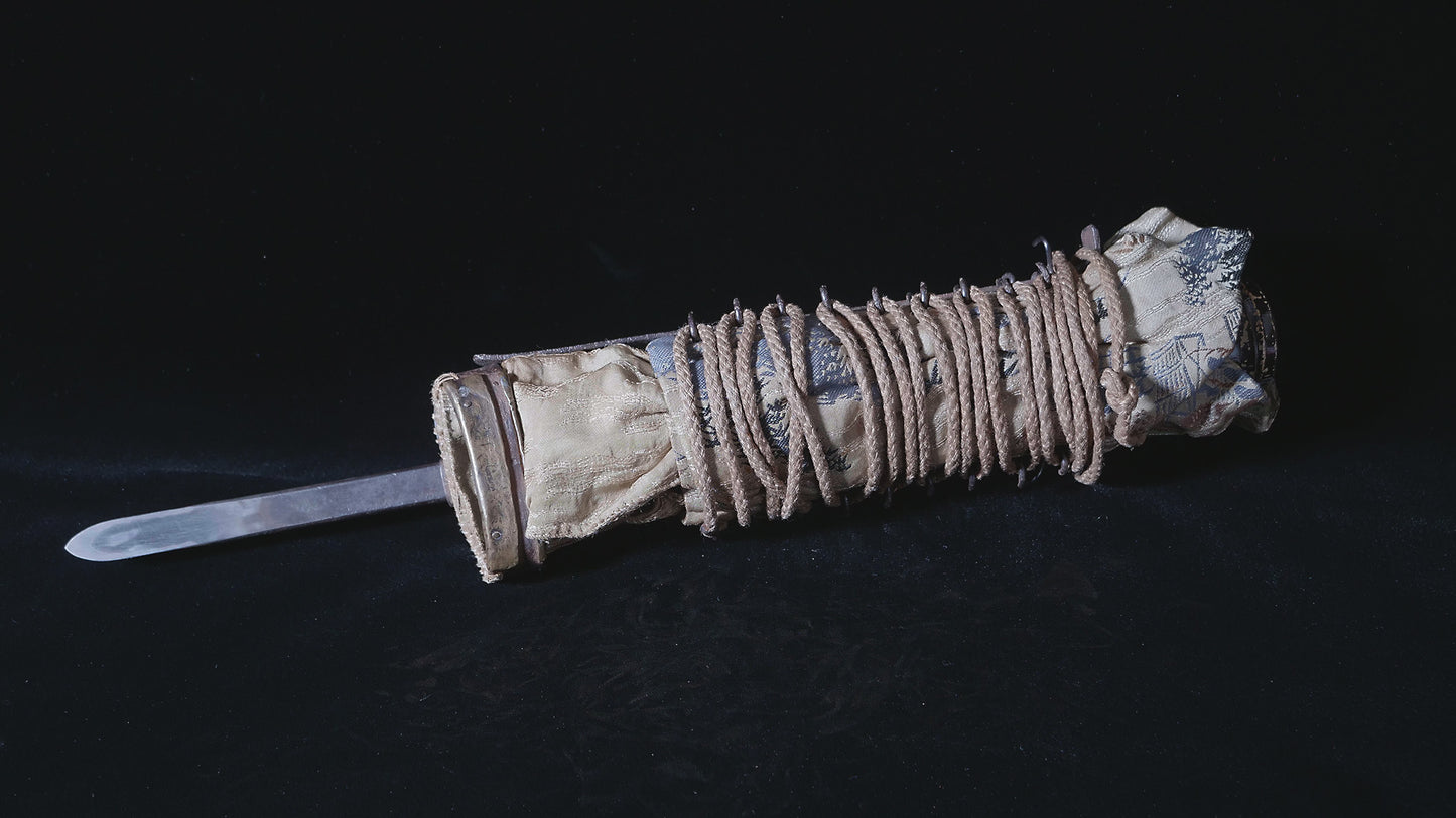 Hand protector with spear and chained weight