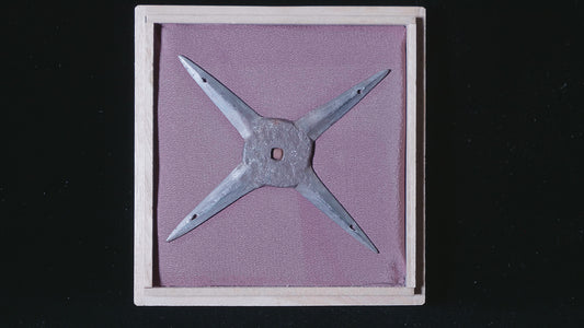 Cross-shaped ninja star (shuriken)