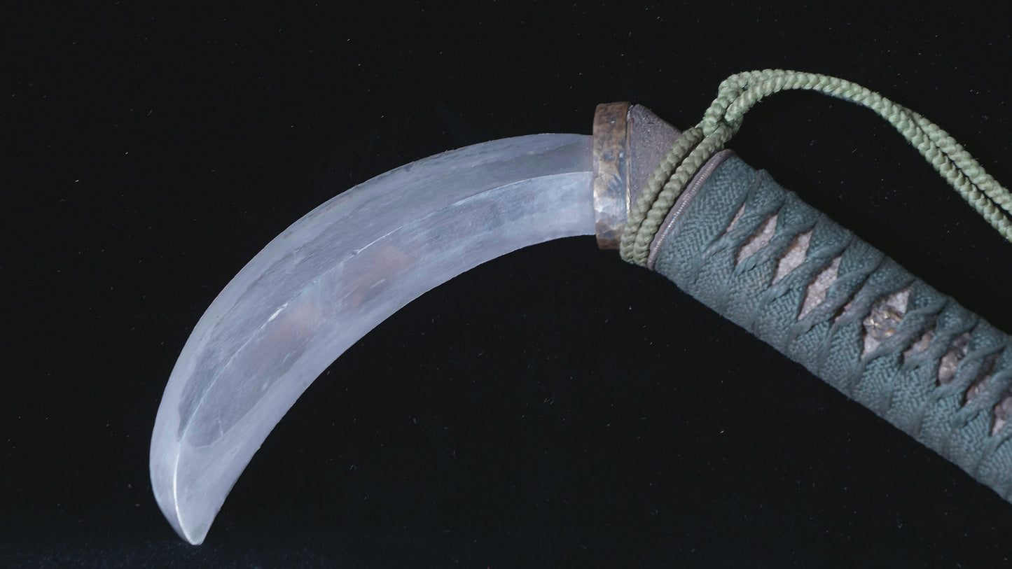 Sickle with knife and chained weight