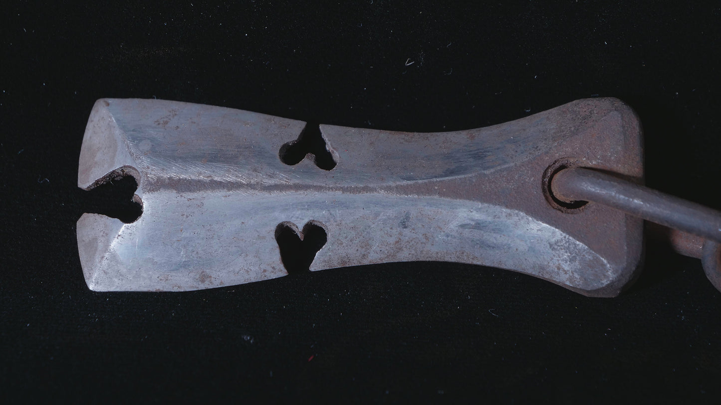 Sickle with knife and chained weight